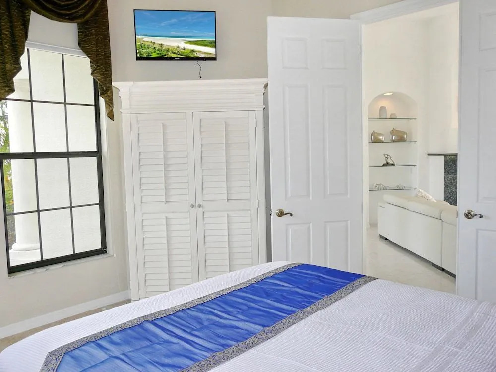 Waterfront home on key lot with pool, spa and views