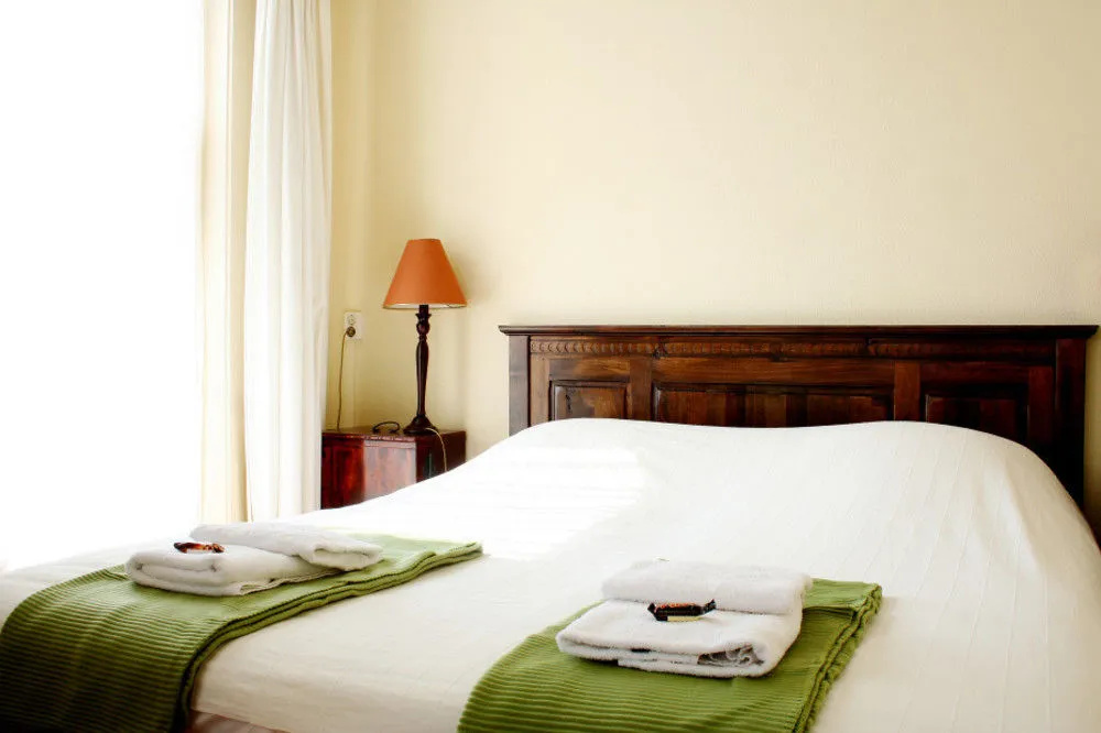 Logement De witte klok