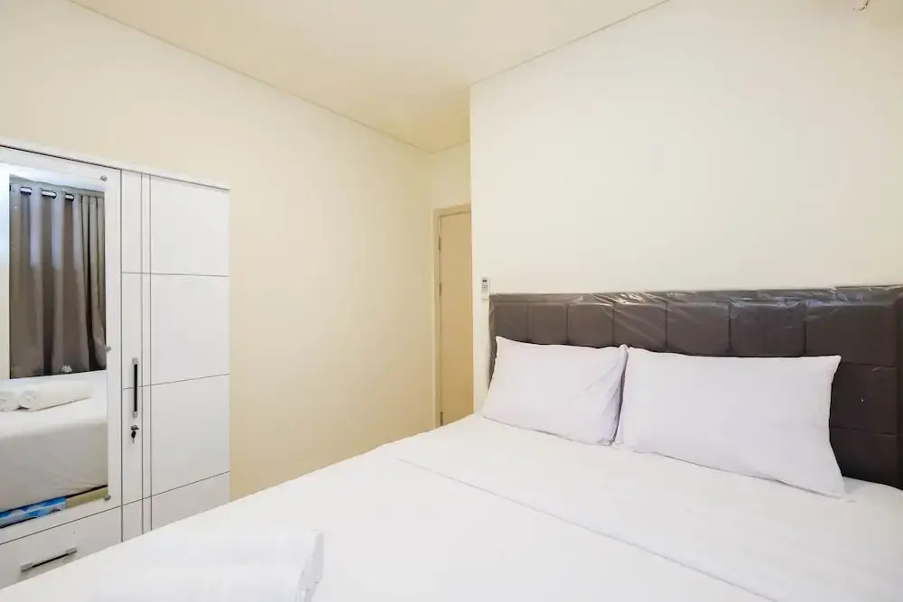 Homey and Cozy Living 1Br + Working Room at Meikarta Apartment