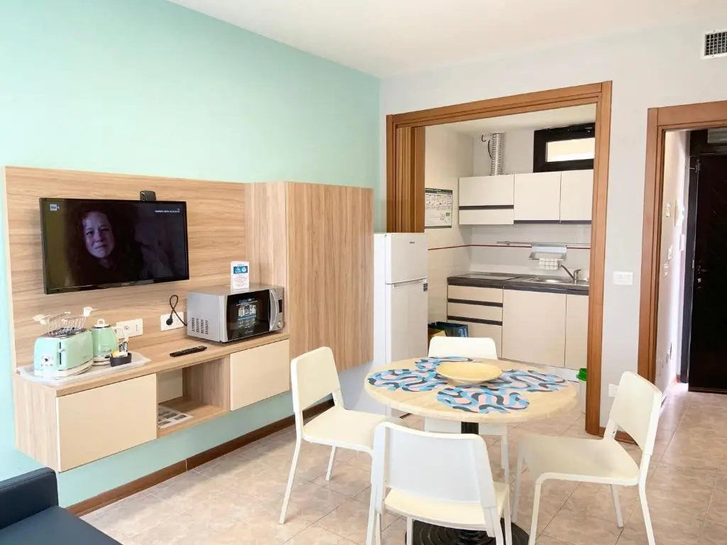Suites Marilia Apartments Pool Side - Suite Livorno Holiday Home Group