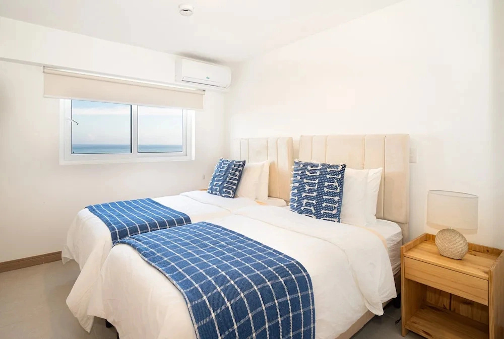 Ocean View Condo Steps to Beach & Comfort
