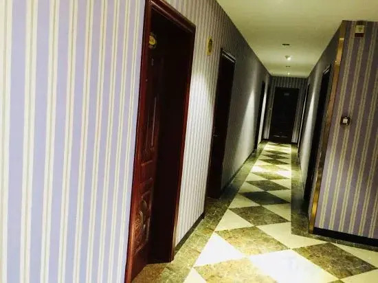 7 xing Ge Business Hotel