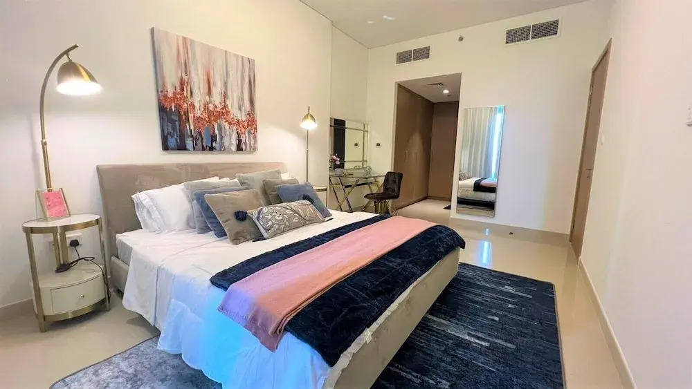 Elegant Luxury Apartment with Stunning Lake Views in Dubai Creek Harbour By ĀYA Boutique