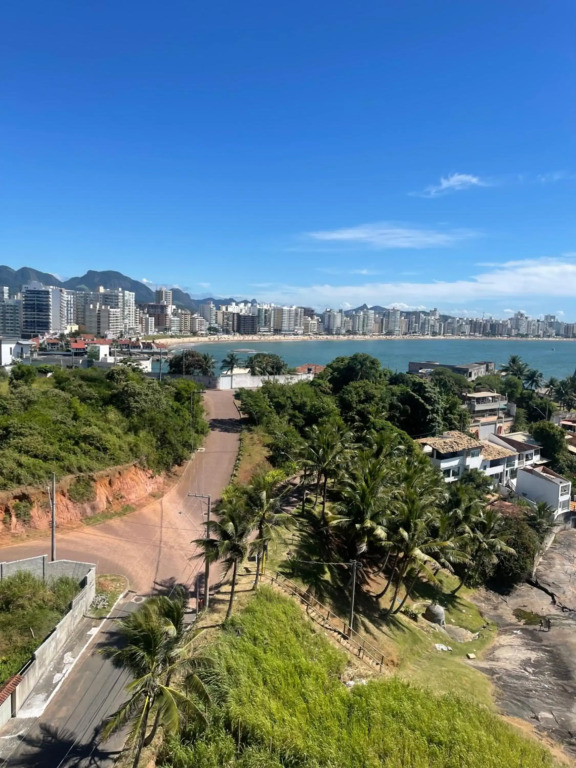Apartamento Guarapari pé na areia com Wi-Fi e Garagem