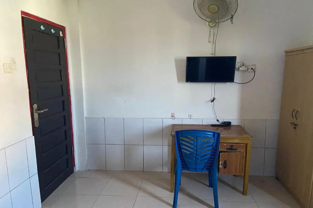 SPOT ON 91623 Pj Guest House Syariah