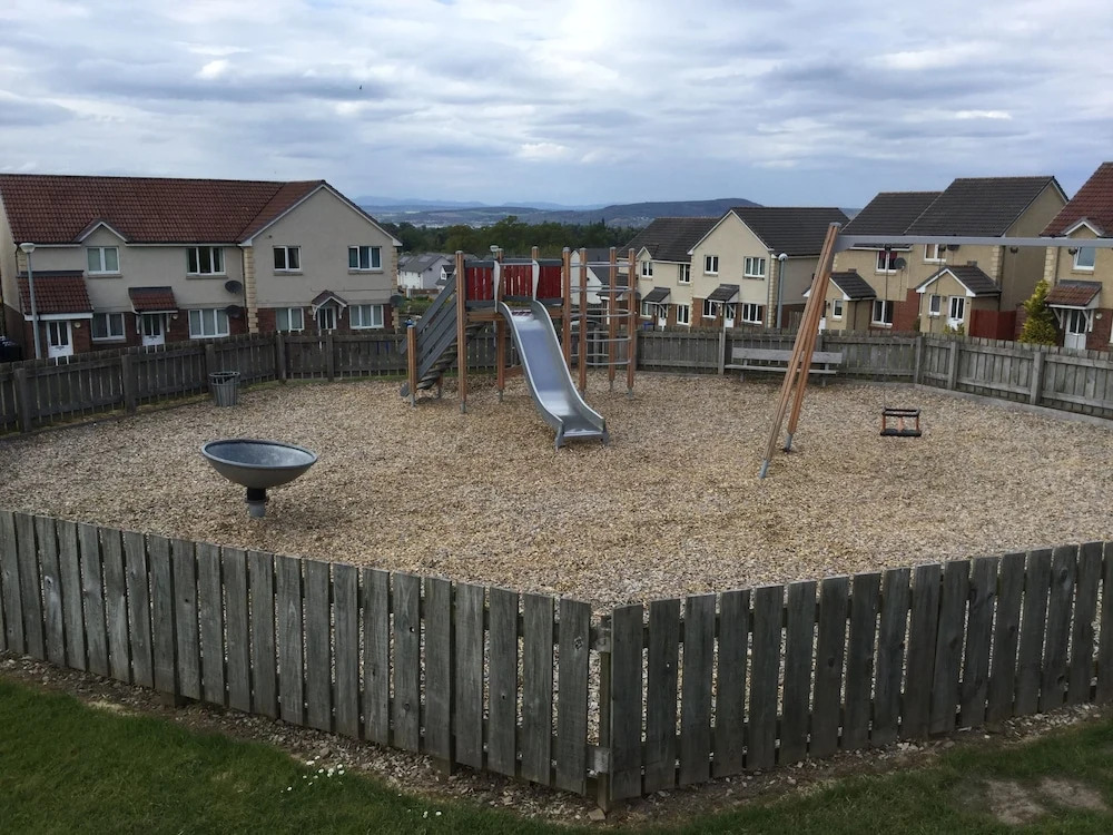 Inverness Apartments - Morning Field