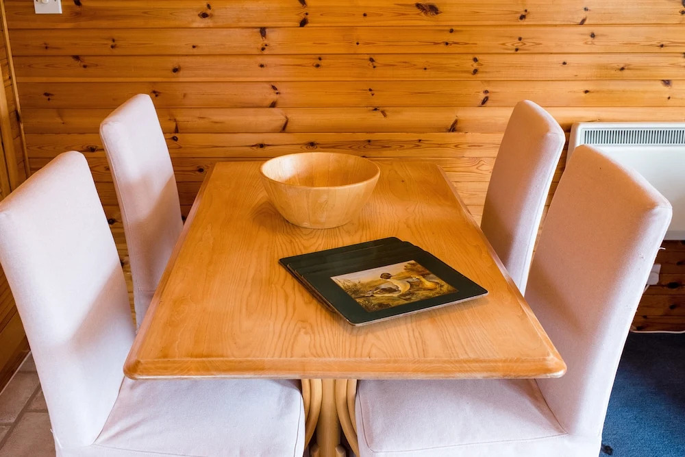 Lapwing Lodge with loch and mountain view