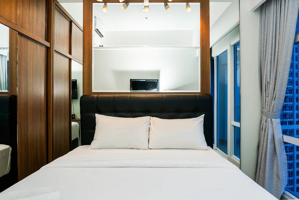 Minimalist Studio Room at Puri Mansion Apartment