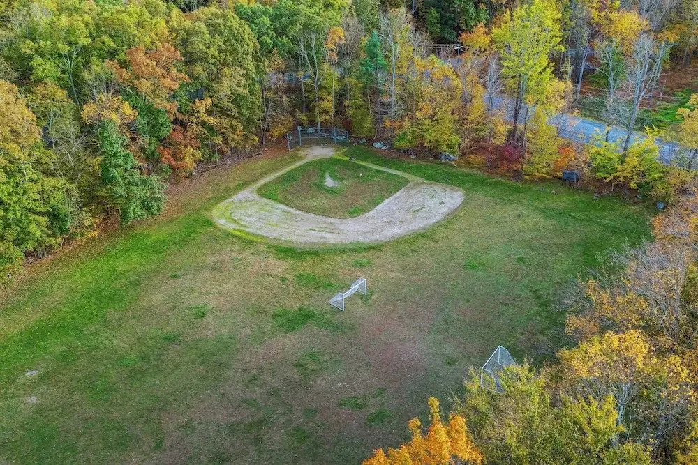 Access to Private Lake, Pools, & Sports Complex Fire Pit Foxden by Avantstay