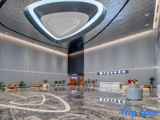 Huayue Kaixuan Grand Hotel (Weiye Building Xincheng Bus Station)
