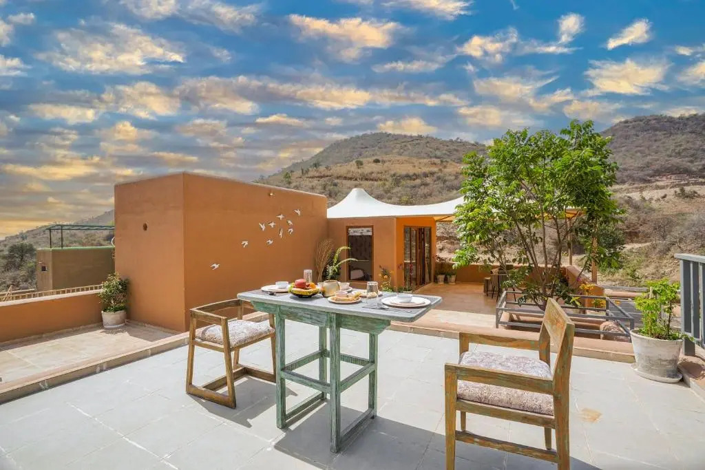 SaffronStays Moringa WishingTree - 3-BR villa near Nathdwara with pool, lawn and hillside views