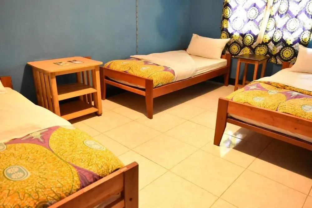 Room in B&B - Amahoro Guest House Triple Room With Shared Bathroom