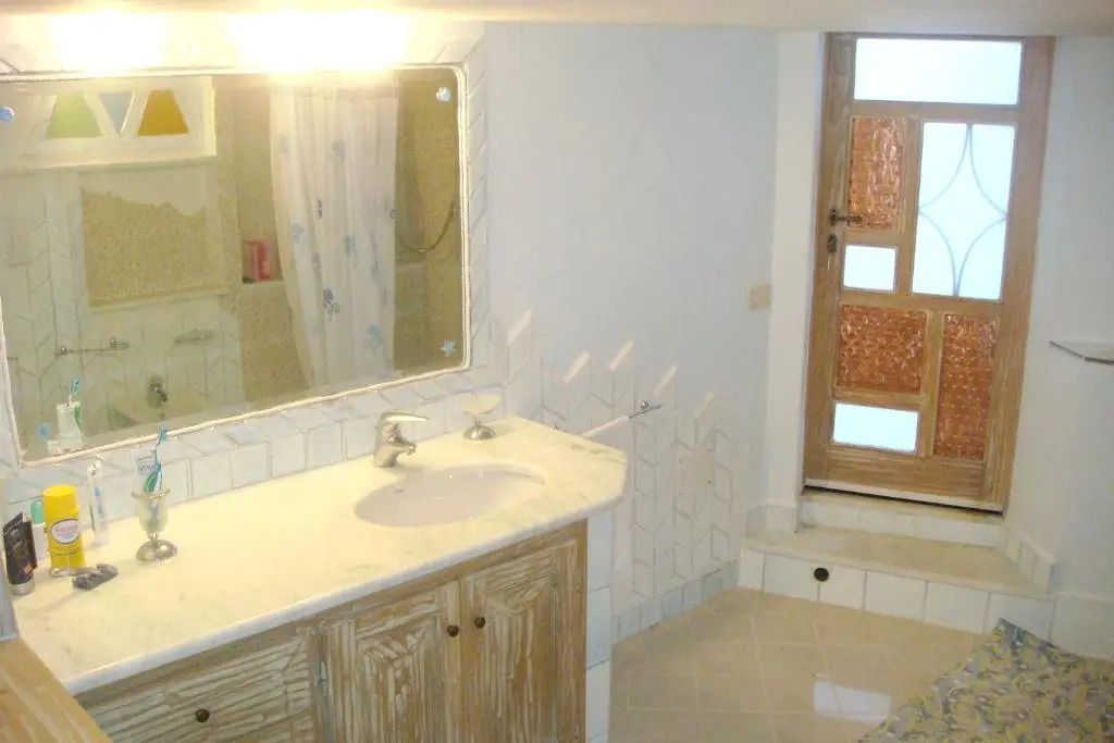 House with 3 bedrooms in Cannigione with wonderful sea view enclosed garden and WiFi 600 m from the beach