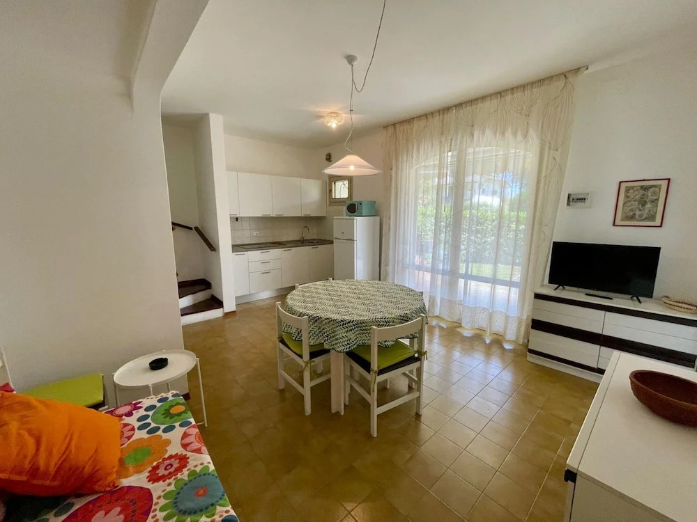 Holiday home with garden and shared pool