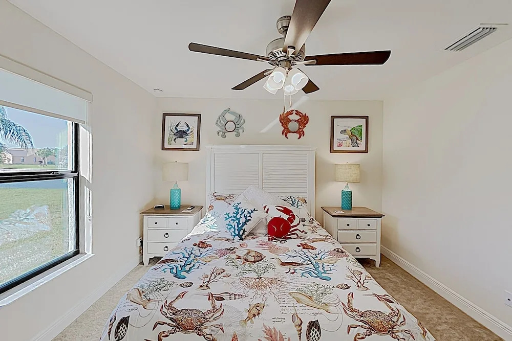 Impeccable Canal-front W/ Lanai & Caged Pool 4 Bedroom Home
