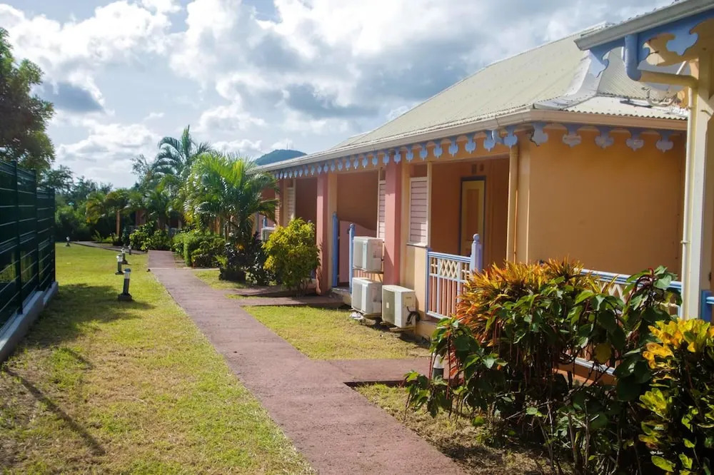 House with One Bedroom in Sainte-Anne, with Wonderful City View, Pool Access And Furnished Terrace - 300 M From the Beach