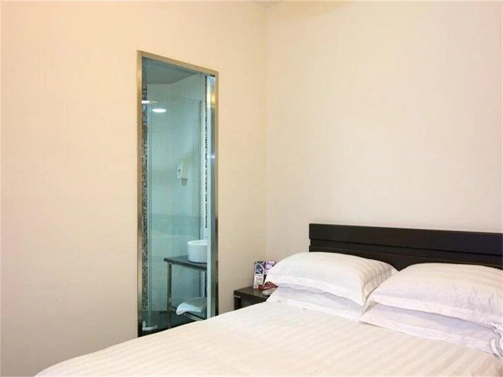 Pinghu Nine Dragon Business Hotel