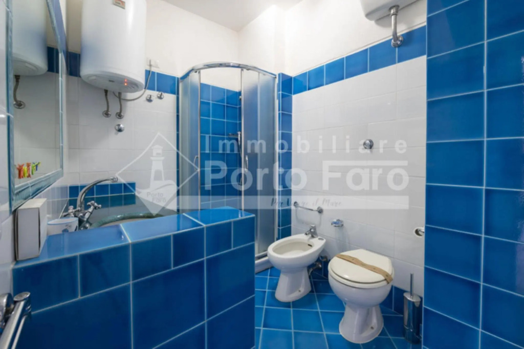 Apartment 12 Centro - THREE ROOM APARTMENT WITH SEASIDE VIEW ON THE PIAZZETTA IN PORTO FARO-12C PORTO FARO
