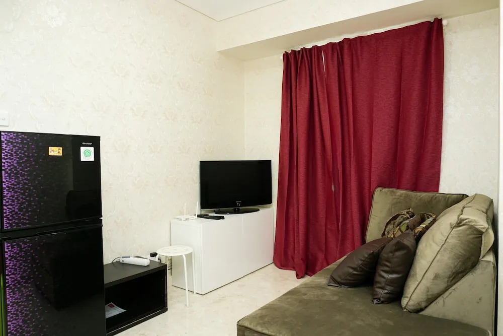 Comfy 2BR Puri Orchard Apartment