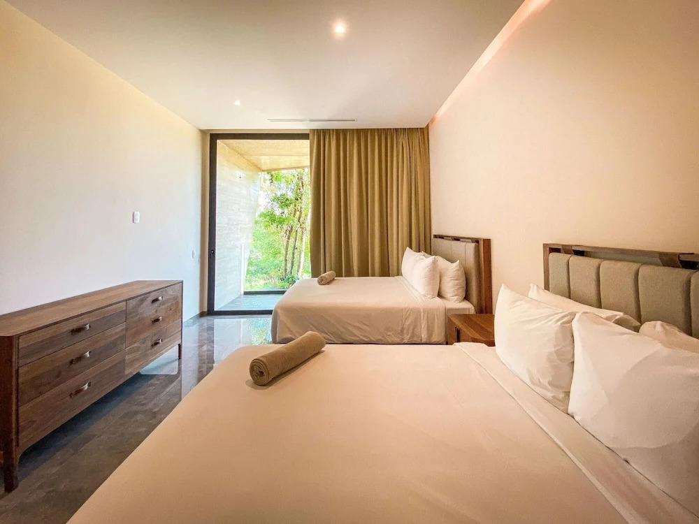 Spacious 2 Bedroom Apartment 10 min From Tulum Ruins Yoga Corner Gym Spa Access Free Shuttle to the Beach Club