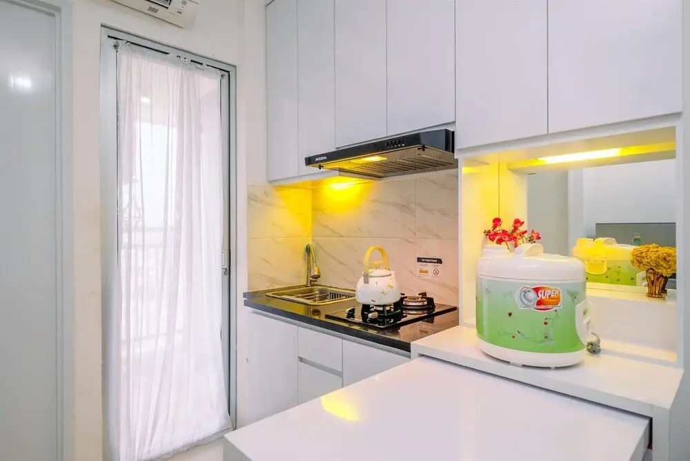 Alluring 2BR at Bassura City Apartment near Mall By Travelio