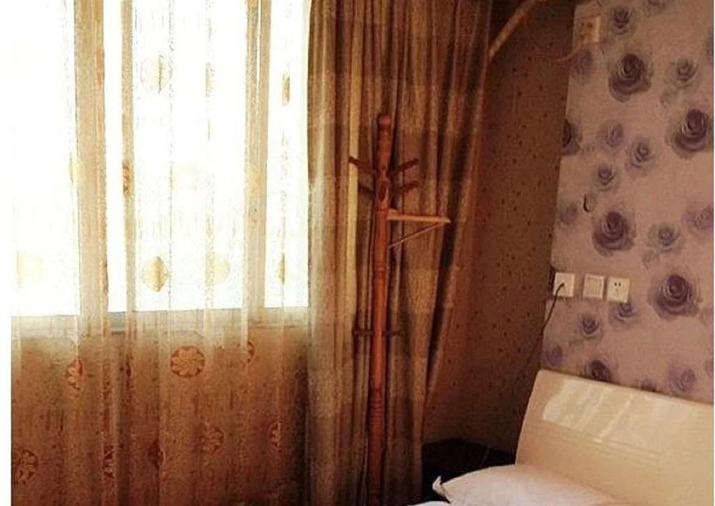 Beichuan Yijia Business Inn