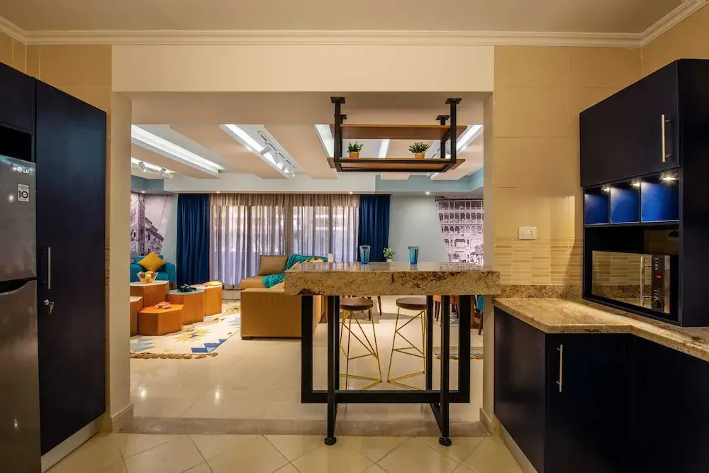 Xuru Stays I Waterfront Designer 2BR - 5 min to Airport