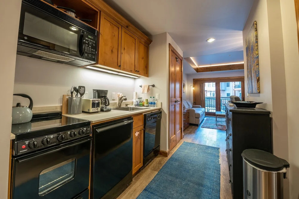 Studio Efficiency Unit With Balcony Over Mountaineer Square 1 Bedroom Condo - No Cleaning Fee! by RedAwning