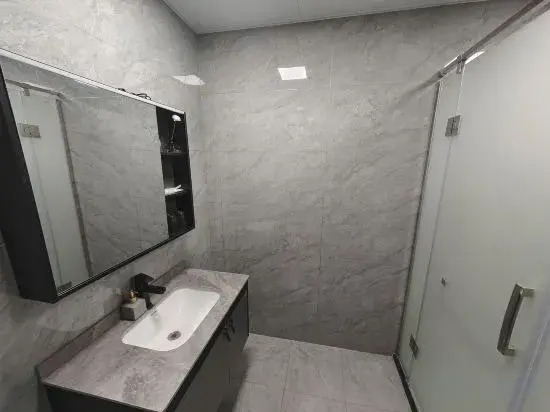 Peach Boutique Hotel (Xinyang Qiansheng Department Store Railway Station)