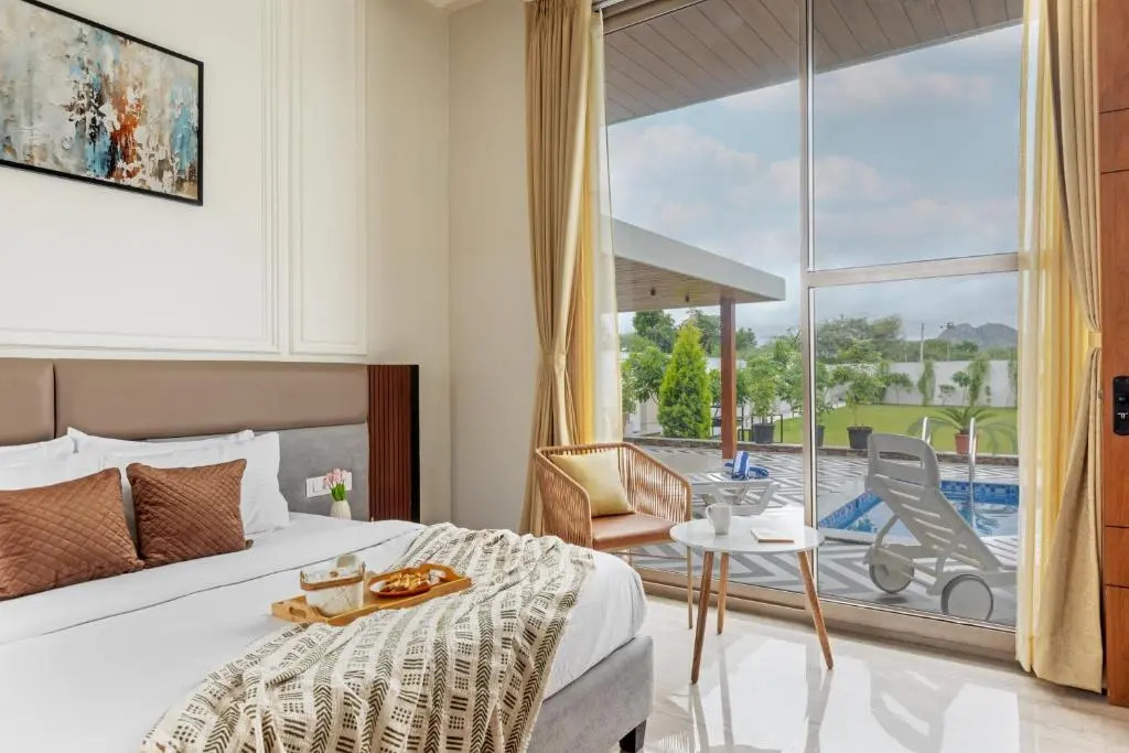 SaffronStays Raaga - luxury 4BR villa with private pool, lawns, gazebos & sweeping Aravalli hill vie