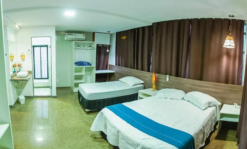 SEGUNDA CASA - Seu cantinho em Guarapari, 1 minuto a pé da Praia do Morro! Suítes confortáveis e modernas - Para casal ou para grupos de até 4 pessoas