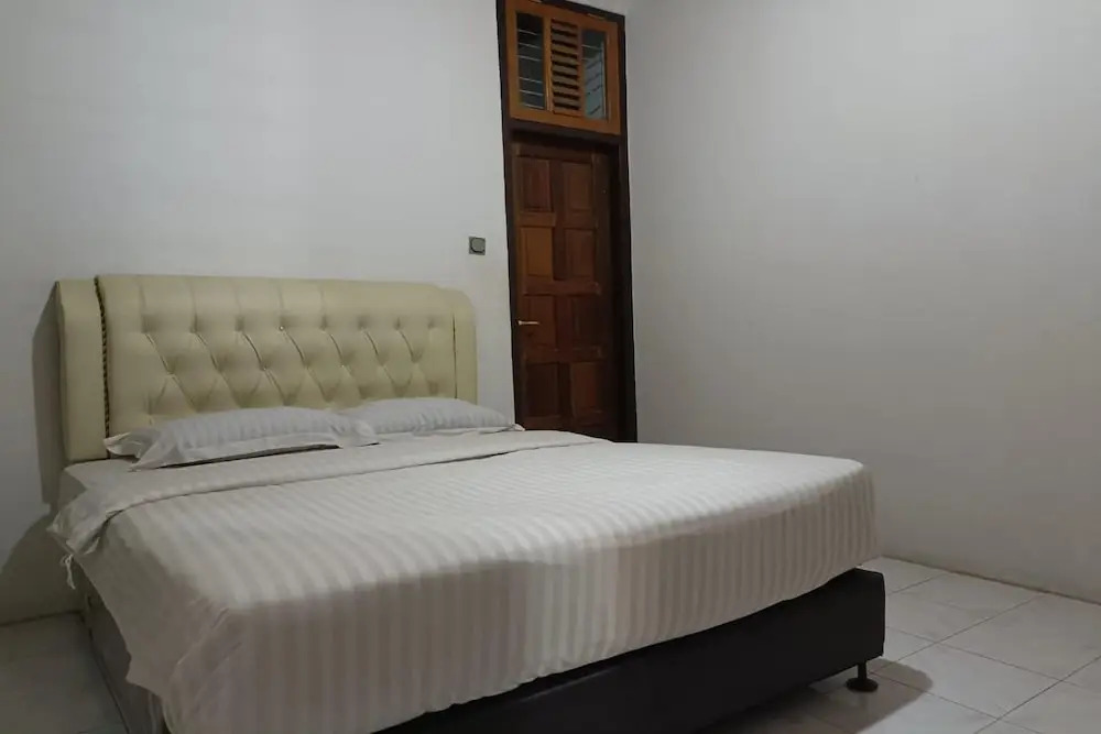 OYO 93706 Penginapan Syariah Hj. Kenan