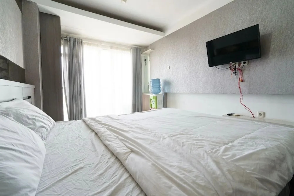 OYO 93424 Apartemen The Suite Metro By Salman