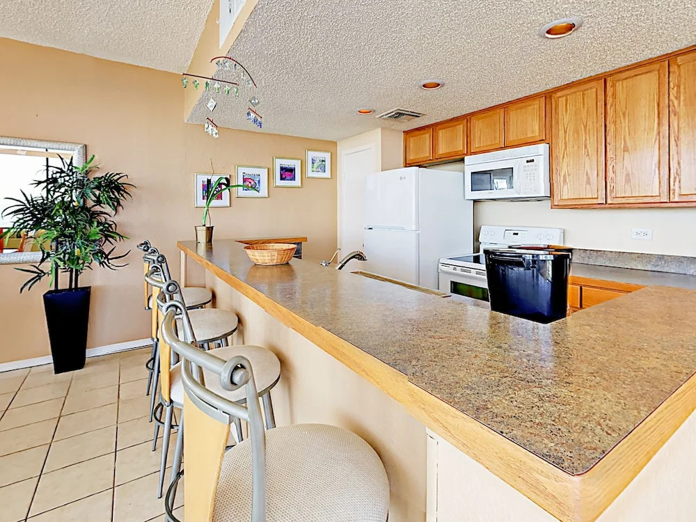 1000 Padre Blvd Condo OFC 715 by RedAwning