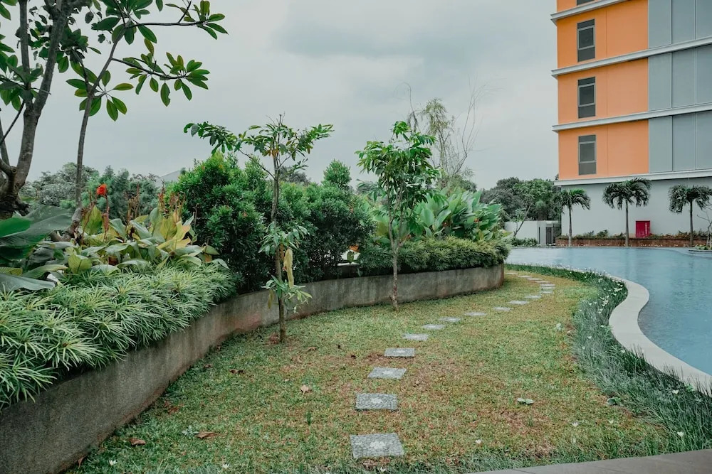 Homey and Fully Furnished 1BR Apartment at Pejaten Park Residence By Travelio