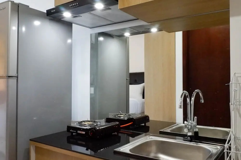 Serene Exclusive Modern Studio Apartment at Grand Sungkono Lagoon By Travelio