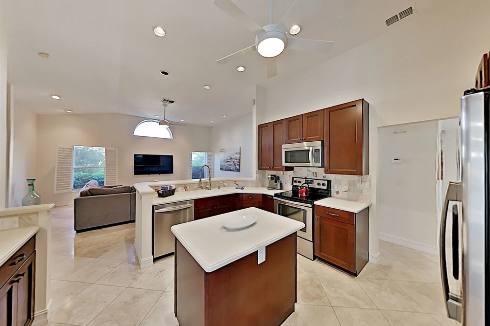Canal-front W/ Boat Dock & Screened Pool 4 Bedroom Home