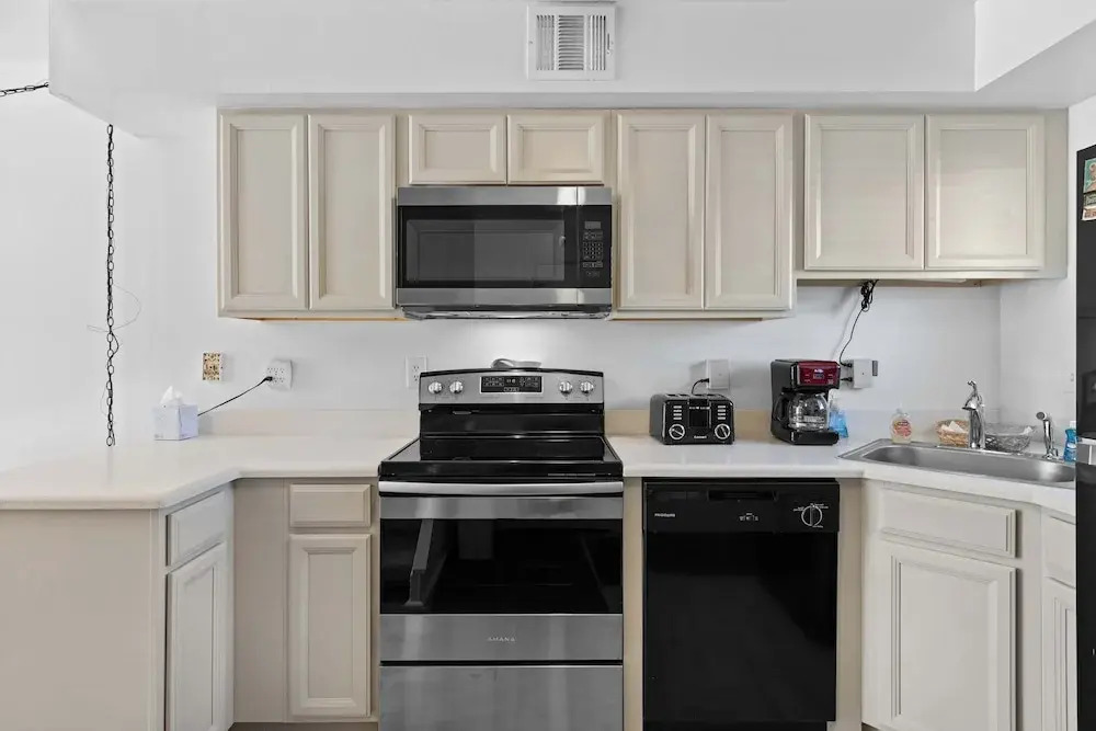 Rustic Harbor I Canal-front 3BR Condo, Private Deck & Fenced Yard