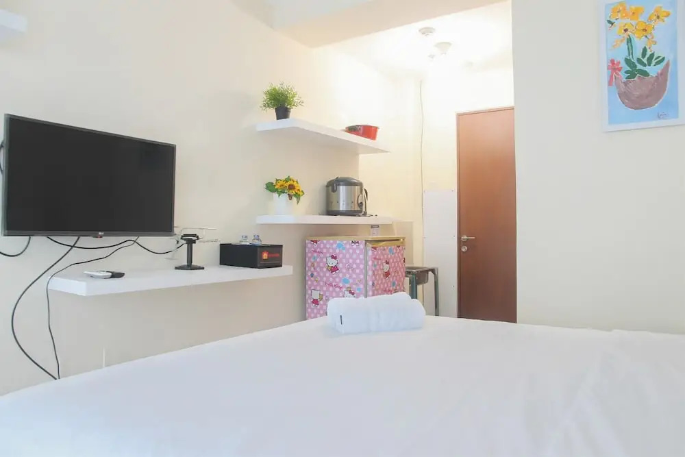 Homey and Comfy Studio @ Tifolia Apartment