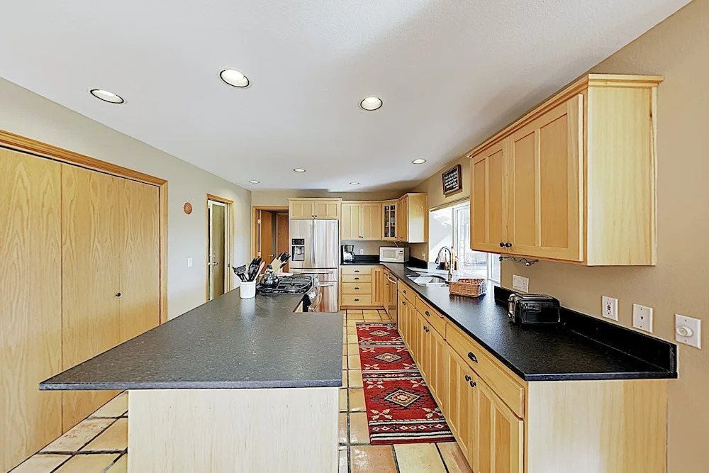 New Listing! All-suite Riverside Getaway W/ Dock 3 Bedroom Home