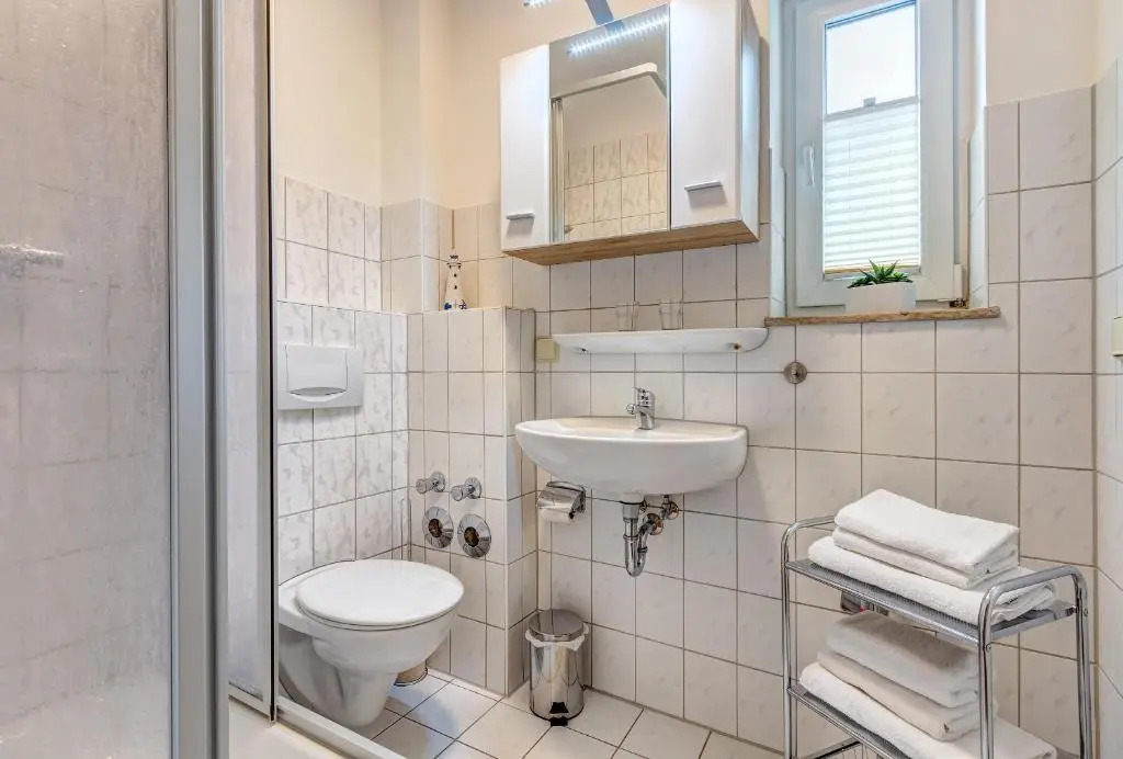 Am Schloonsee Haus D - Apartments mit Strandkorb