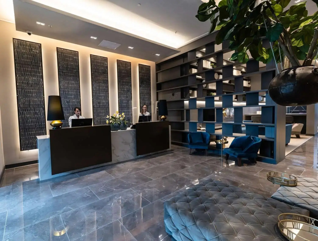 York Medellin, Curio Collection by Hilton