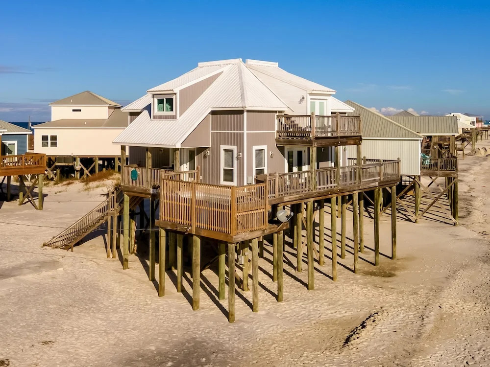 Strand Castle - Gulf Front! An Ideal Layout With Game Room, Small Private Pool, And Roof Top Crow's Nest! 4 Bedroom Home by RedAwning