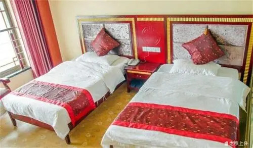 Emeishan Sanyuan Shuzhuang Home Stay