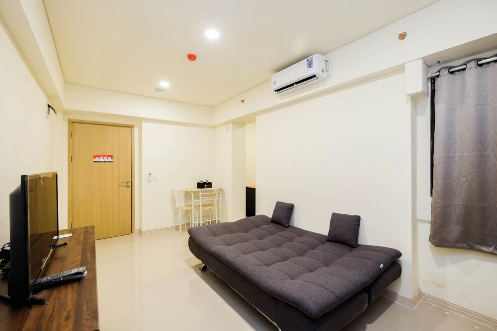 Homey and Cozy Living 1Br + Working Room at Meikarta Apartment