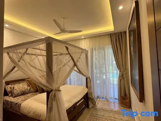 Luxurious 1bedhideaway with pool, AC &beach access
