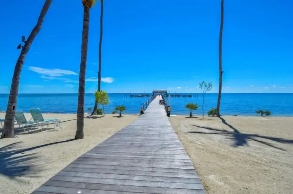 Direct Oceanfront With Private Staircase To Beach Prestigious Islamorada Condocomplex 2 Bedroom Condo by RedAwning