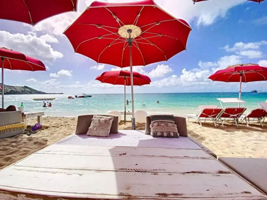Pavillon Beach 9, feet in the water in Grand Case