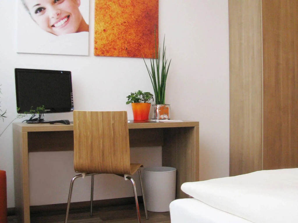 Orange Hotel und Apartments