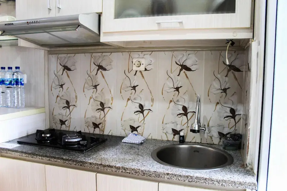 Fully Furnished and Cozy Design 1BR Green Pramuka Apartment